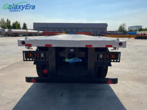 White flatbed semi-trailer chassis frame showing reinforced cross-member design